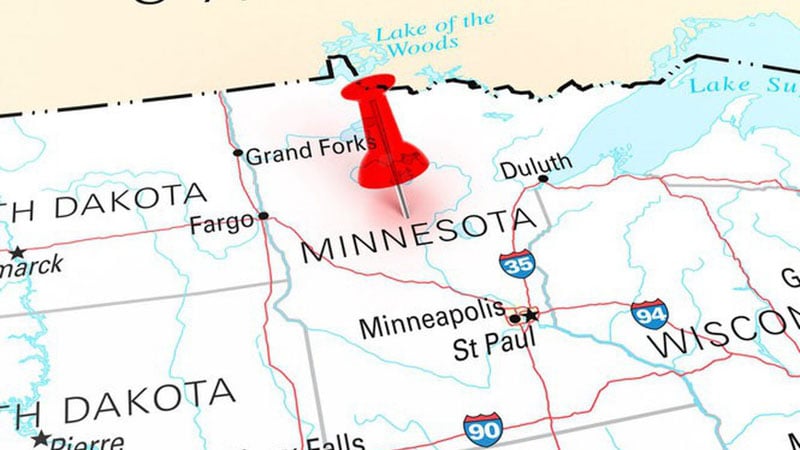 Minnesota on a map with a red pin on the state