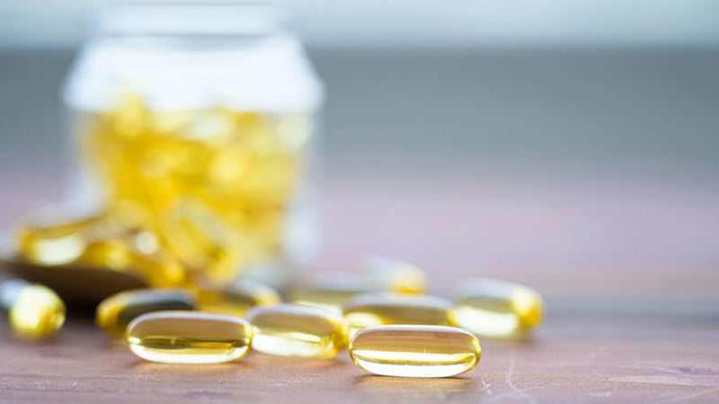CBD capsules and softgels on a table