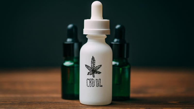 CBD Oil White Bottle with Two Dark Bottles for Sleep